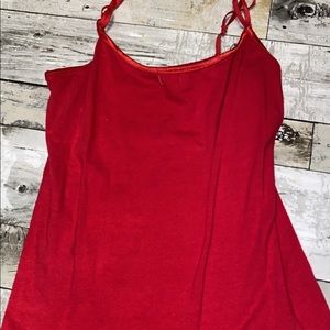 not skin tight but not loose. red long tank top.